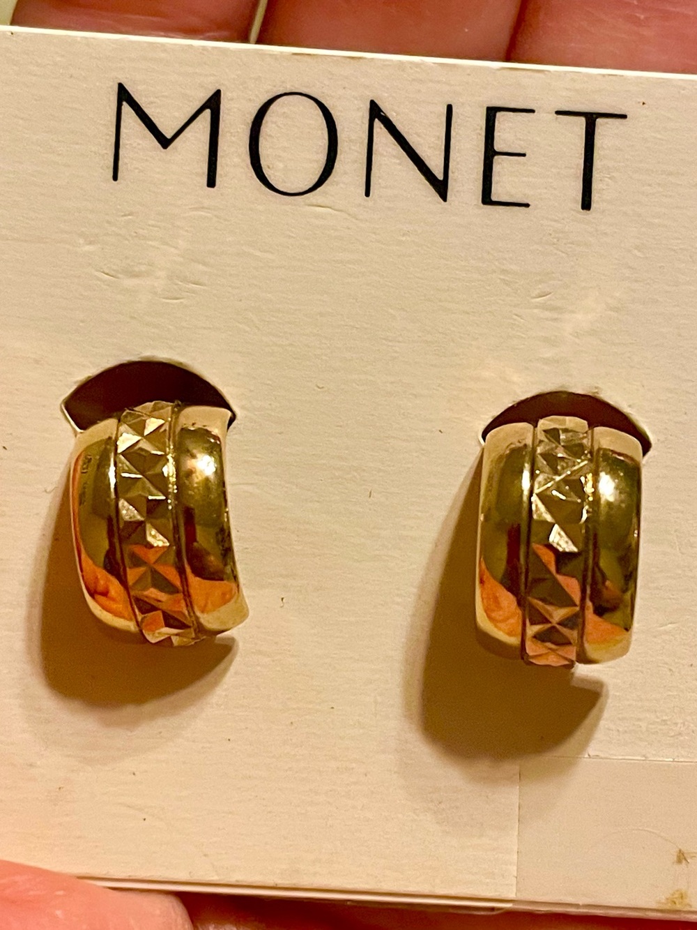 Vintage Monet gold tone etched center small clip on hoop earrings